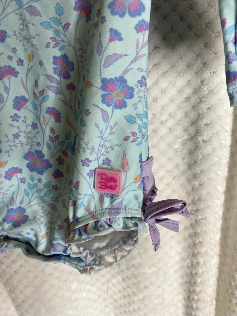 Ruffle Butts Light Blue Floral Long Sleeve One Piece Swimsuit